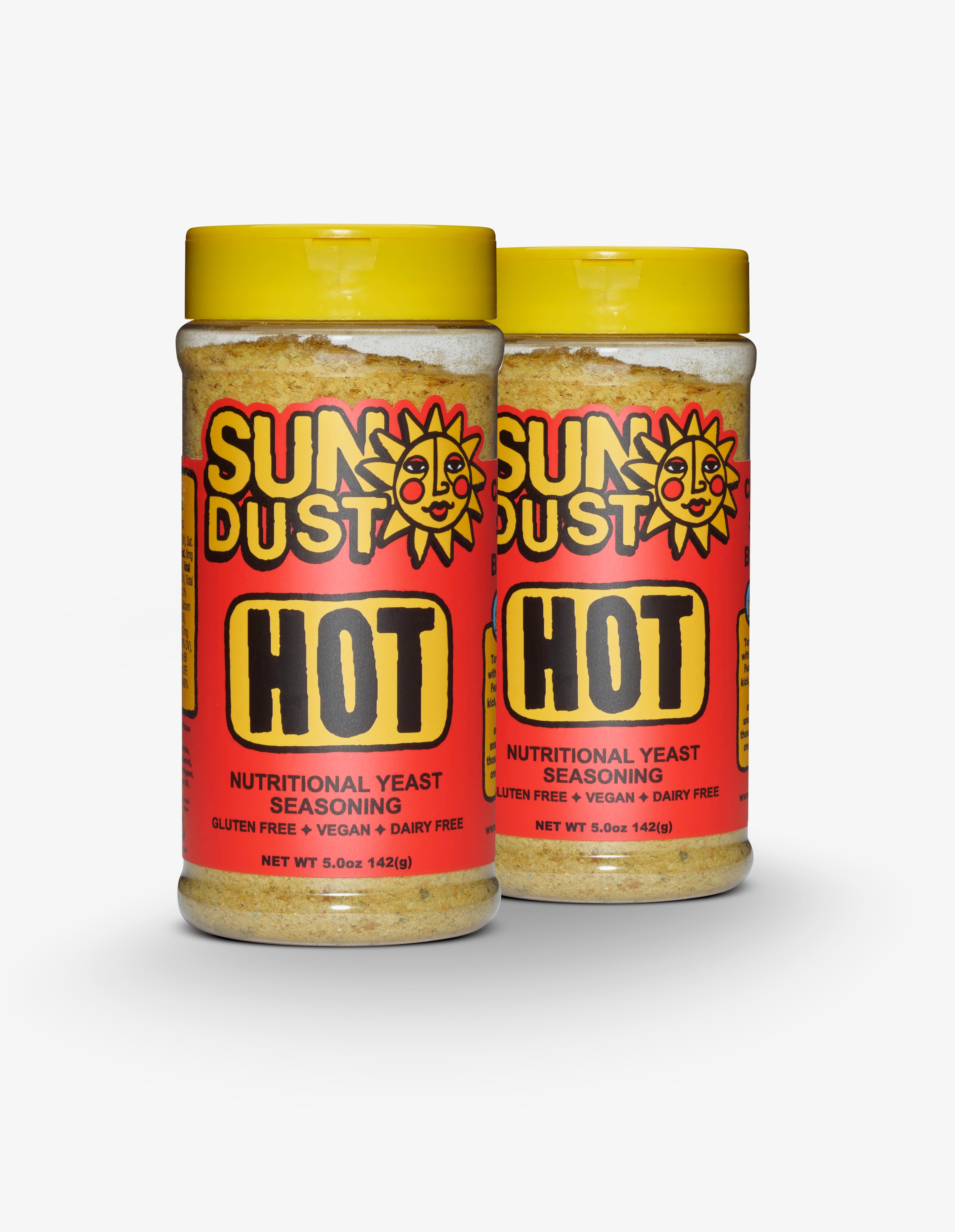 Two jars of Sun Dust Hot Nutritional Yeast Seasoning on a white background